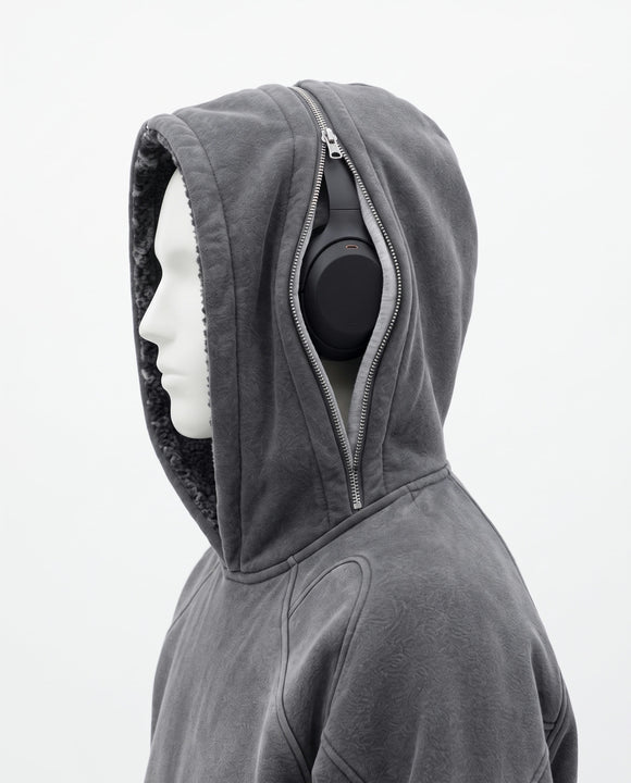 Headphones inside the HoodWave hood pocket